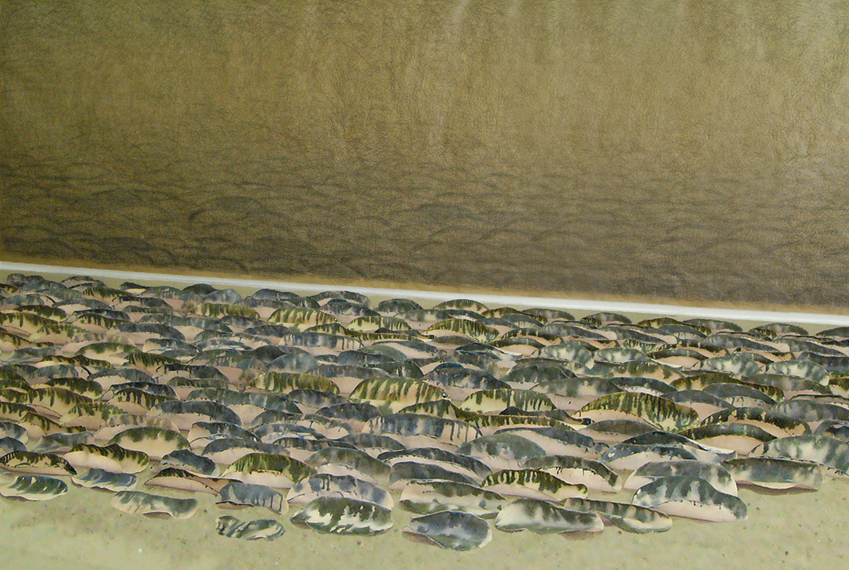 Ceramics installation on sand. Background - drawing on paper. Artist Tanya Atanasova